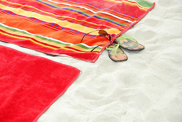 Image showing Beach towels on sand