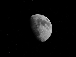 Image showing Black and white Gibbous moon with stars