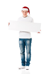 Image showing Young man in Santa hat