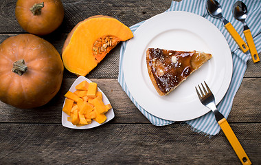 Image showing Lunch piece of pie Pumpkin slices in Rustic style