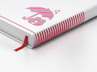 Image showing Safety concept: closed book, Family And Umbrella on white background