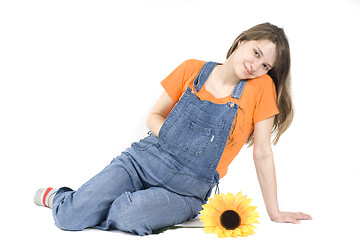 Image showing Portrait of a happy pregnant woman with sunflower