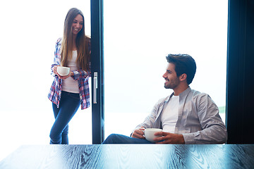 Image showing relaxet young couple drink first morning coffee