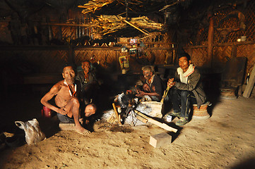 Image showing Men around fire in Nagaland, India