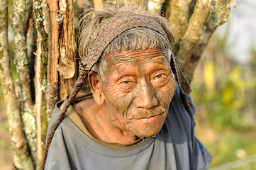 Image showing Old man carrying load in Nagaland, India