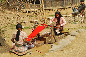 Image showing Young women producing textile in Nagaland, India