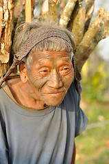 Image showing Old man carrying load in Nagaland, India