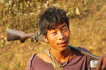 Image showing Young man with rifle in Nagaland, India