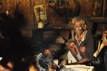 Image showing Sitting around fire in Nagaland, India
