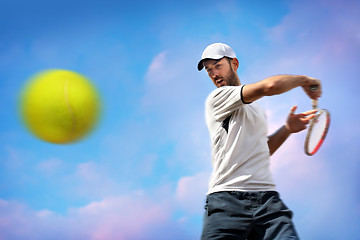 Image showing male tennis player in action 