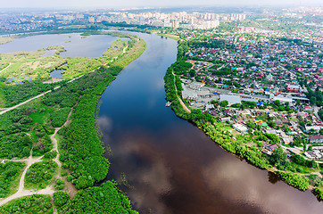 Image showing Disrict of private houses on bank of river. Tyumen