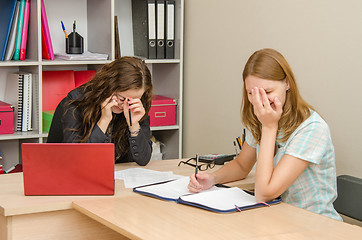 Image showing Two employees of laughing at work in the office