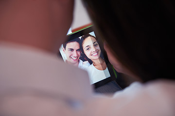 Image showing couple at modern home using tablet computer