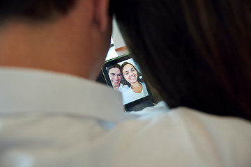 Image showing couple at modern home using tablet computer