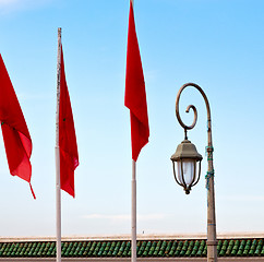 Image showing tunisia  waving flag in the blue sky  colour and street lamp 