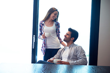 Image showing relaxet young couple drink first morning coffee