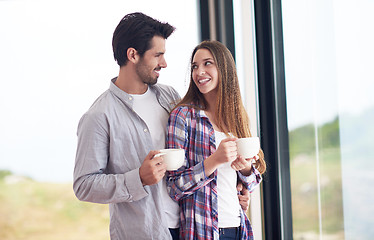 Image showing relaxet young couple drink first morning coffee