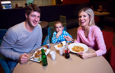 Image showing family having lunch in shopping mall