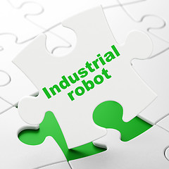 Image showing Industry concept: Industrial Robot on puzzle background