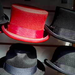 Image showing in london old red hat and black  the  fashion shop