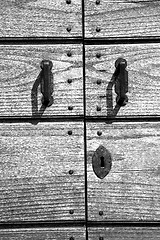 Image showing door    in italy old ancian wood and traditional  texture nail