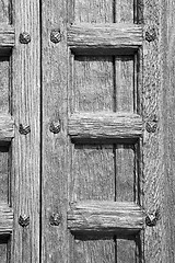 Image showing door    in italy old ancian wood and traditional  texture nail