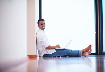 Image showing working on laptop computer from home