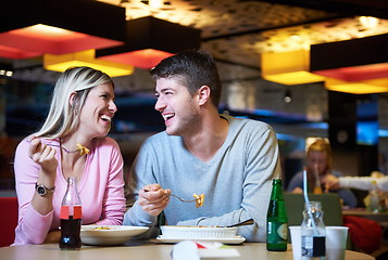 Image showing couple having lunch break in shopping mall