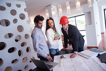 Image showing couple buying new home with real estate agent