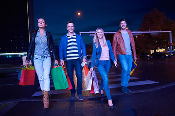 Image showing Group Of Friends Enjoying Shopping