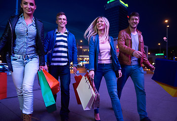 Image showing Group Of Friends Enjoying Shopping