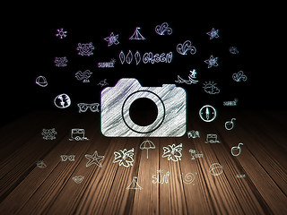 Image showing Tourism concept: Photo Camera in grunge dark room