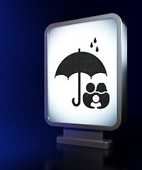 Image showing Security concept: Family And Umbrella on billboard background