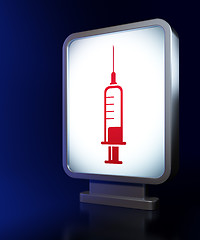 Image showing Health concept: Syringe on billboard background