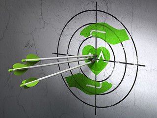 Image showing Insurance concept: arrows in Heart And Palm target on wall background