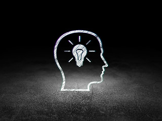 Image showing Studying concept: Head With Lightbulb in grunge dark room
