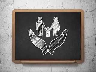 Image showing Insurance concept: Family And Palm on chalkboard background