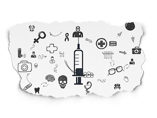 Image showing Health concept: Syringe on Torn Paper background