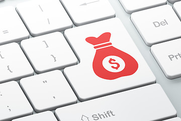 Image showing Finance concept: Money Bag on computer keyboard background