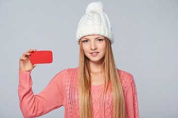 Image showing Woman wearing woolen hat and sweater