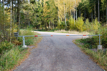 Image showing one small road with a road barriier 