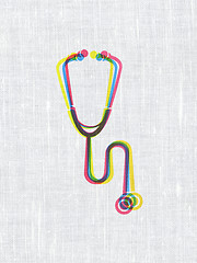 Image showing Medicine concept: Stethoscope on fabric texture background