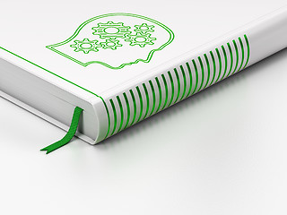 Image showing Advertising concept: closed book, Head With Gears on white background