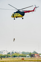 Image showing Rescuers are landed from MI-8 helicopter