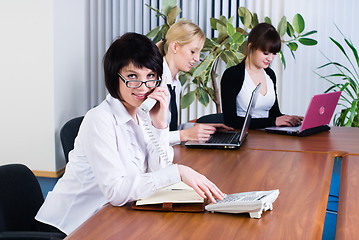 Image showing Three young executives at meeting at office