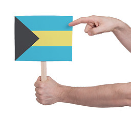 Image showing Hand holding small card - Flag of Bahamas