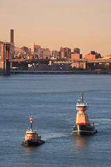 Image showing Reinauer tugboats in East River