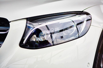 Image showing Detail on the headlight of car