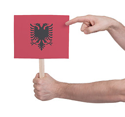 Image showing Hand holding small card - Flag of Albania