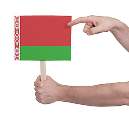 Image showing Hand holding small card - Flag of Belarus